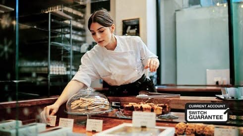 Small business owner at counter